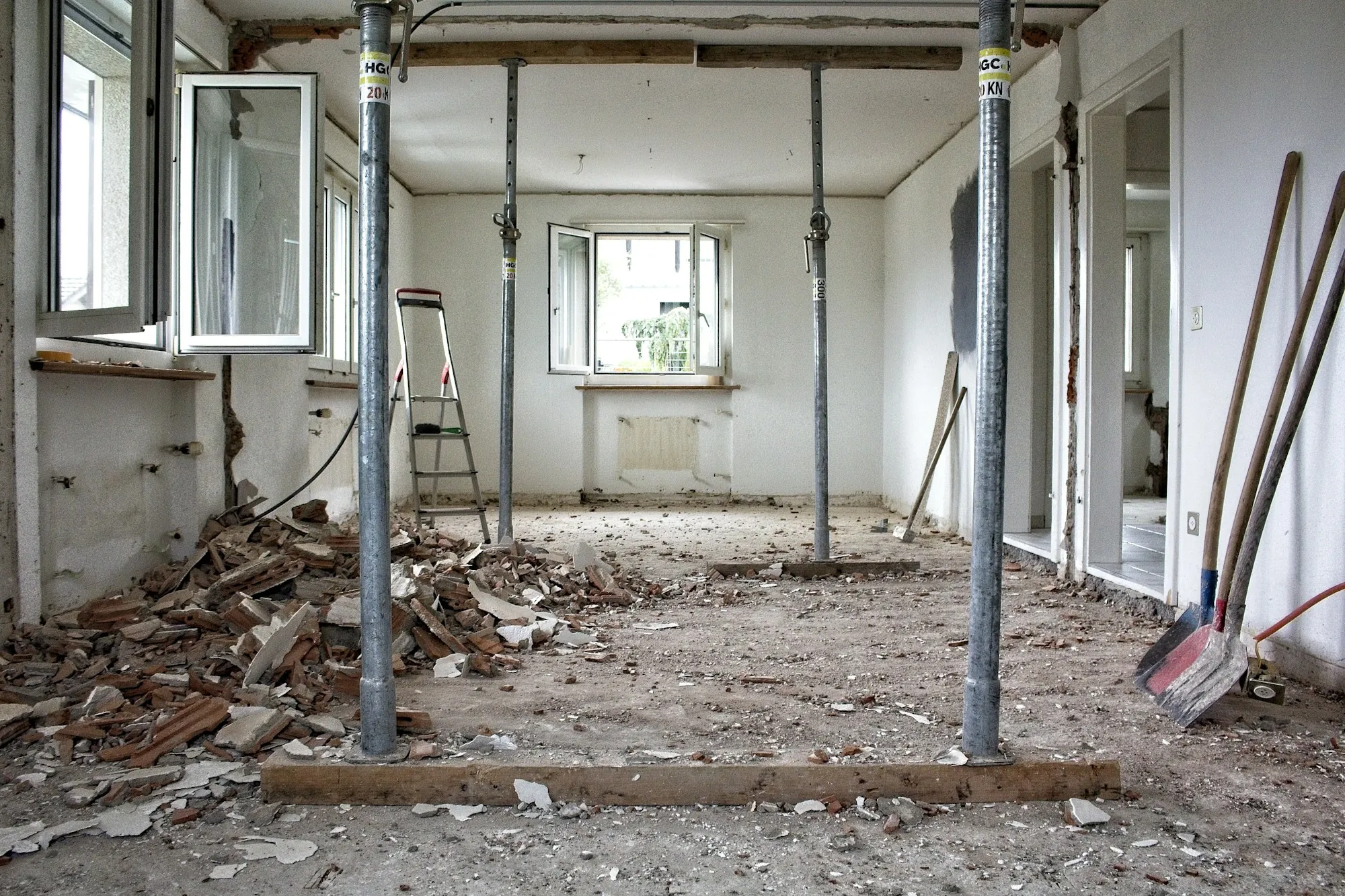 Empty room with temporary supports during renovation